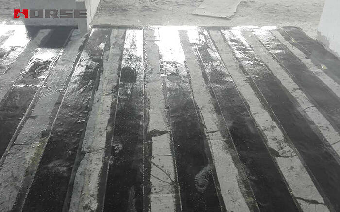 تقوية البلاطة باستخدام غلاف بوليمري مقوى بالألياف