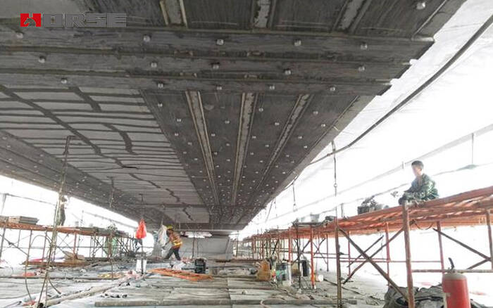 beams strengthened with bonded steel plates