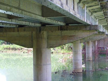 تعزيزات ألواح فولاذية ملتصقة بالإيبوكسي على الجسر