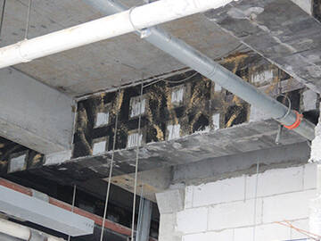 تقوية الأعمدة والعوارض باستخدام غلاف الكربون المقوى (CFRP)