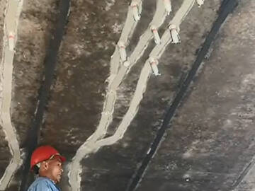 إصلاح شق الخرسانة في الجسر باستخدام مادة لاصقة حقن هيكلية