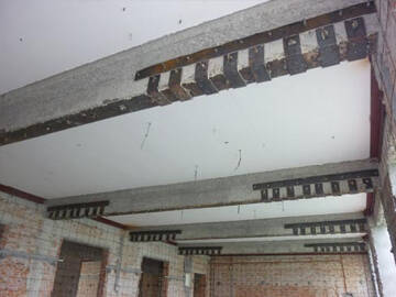 عارضة خرسانية مسلحة مع صفائح فولاذية مثبتة وملتصقة